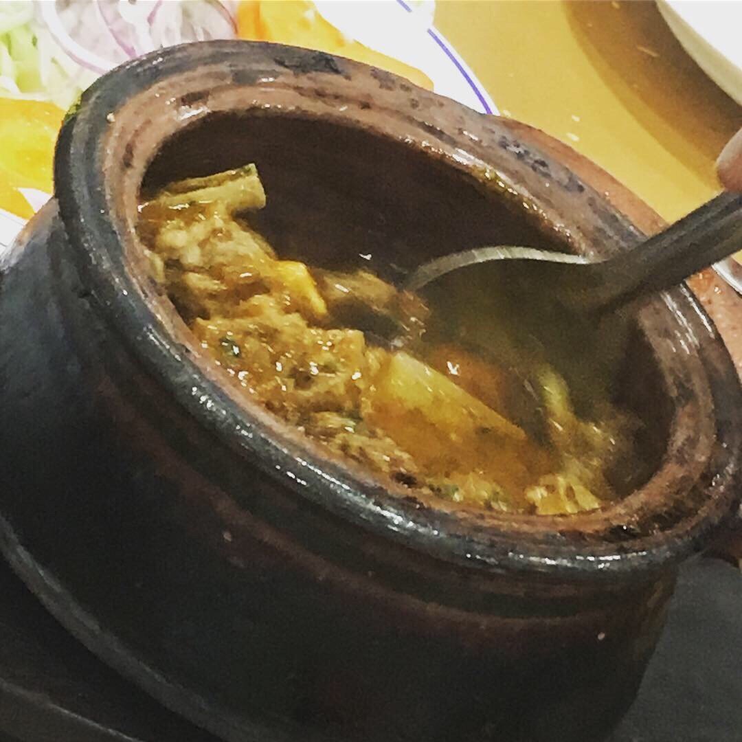 Clay-pot karahi served at the table